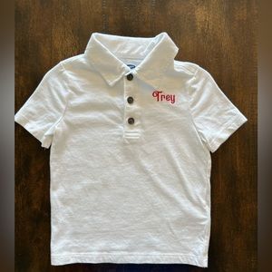 Old Navy white polo monogrammed with “Trey” in red
